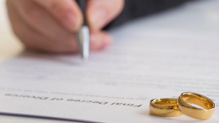 husband signing decree of divorce