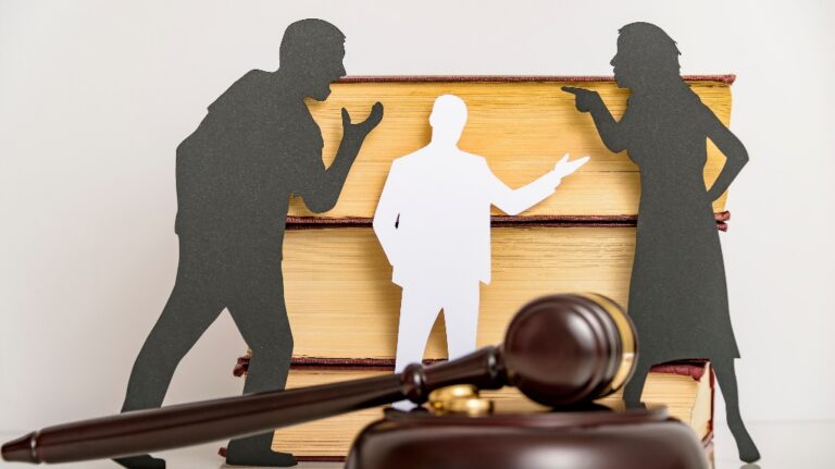 People arguing with a gavel in the middle